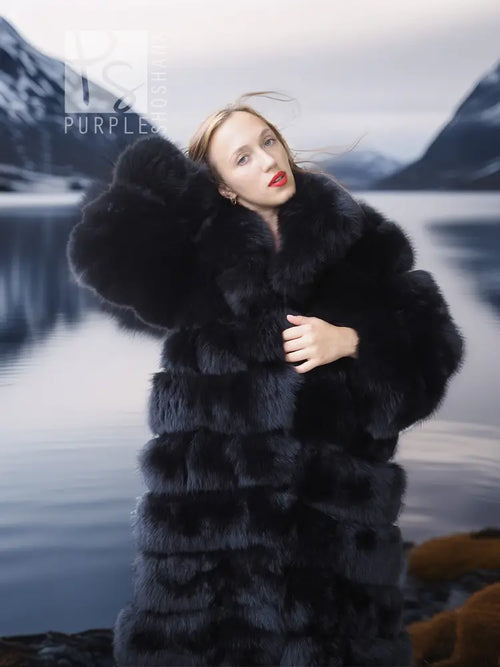 Black fox fur coat with shawl collar, thick fur texture, model close-up shoulder view.