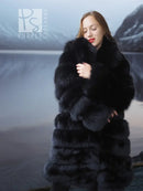 Black fox fur coat with shawl collar, close-up with hand at front