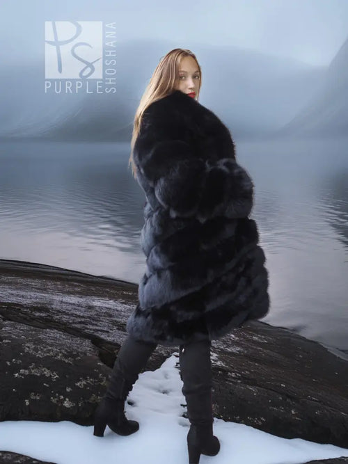 Black fox fur coat with shawl collar and plush wrap front, long sleeves