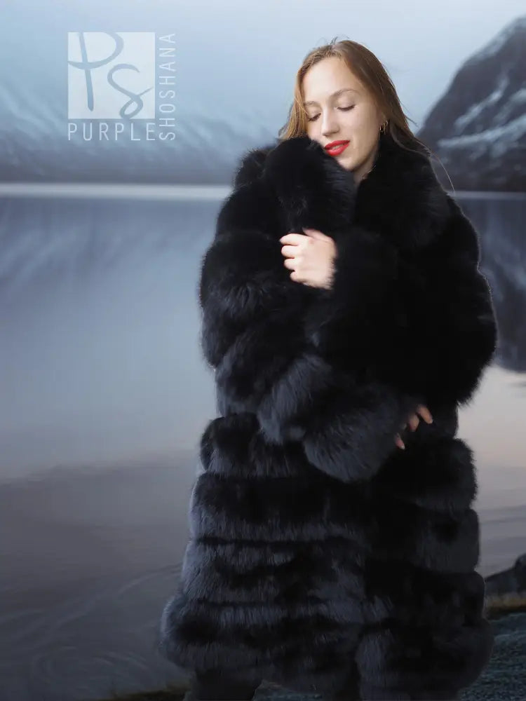 Black fox fur coat with shawl collar, long sleeves, open neckline, thick plush tiered design