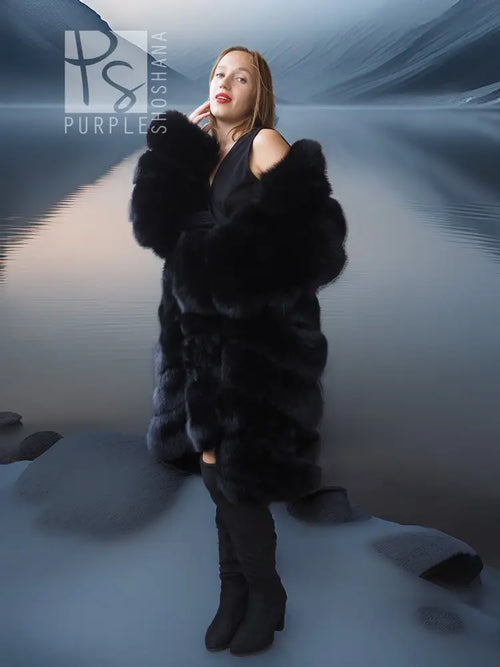 Black fox fur coat with shawl collar, long sleeves, open front, plush tiered body and cuffs