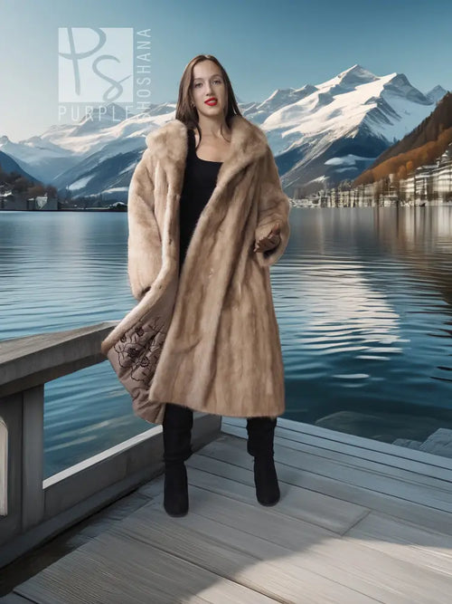 Beige full-length mink coat with fur collar and side profile, black boots