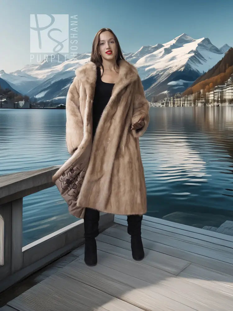 Beige full-length mink coat with fur collar and side profile, black boots