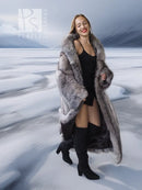 Long gray faux-fur coat with open front and wide sleeves, worn over a black dress