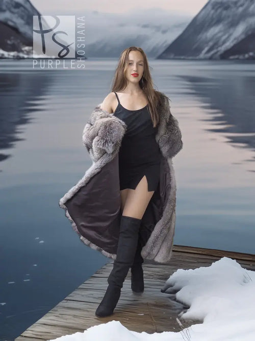 Long gray faux-fur coat with open collar and plush shoulder detail over black top