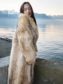 Full-length tan faux fur coat with shawl collar, straight silhouette and open front