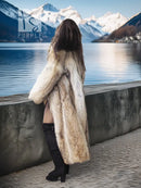 Light beige fur coat with shawl collar, open front, long sleeves, calf-length.