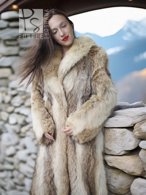 Tan faux fur coat with shawl collar, close-up view of textured fur sleeves and front