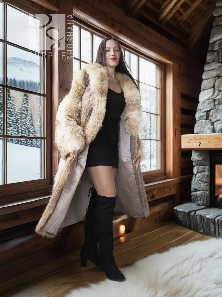 Light beige fur coat with shawl collar, open front, relaxed fit, long sleeves.