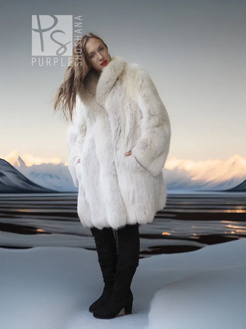 White faux fur fox coat with dramatic shawl collar and voluminous silhouette