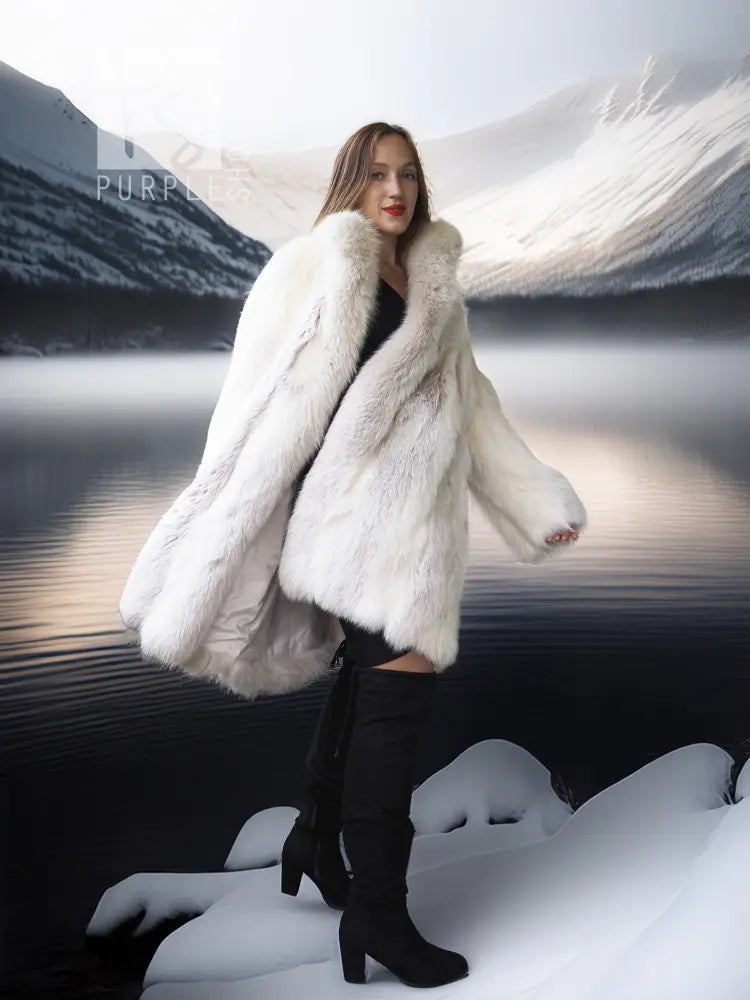 White faux fur fox coat with wide, draped sleeves and plush hooded collar