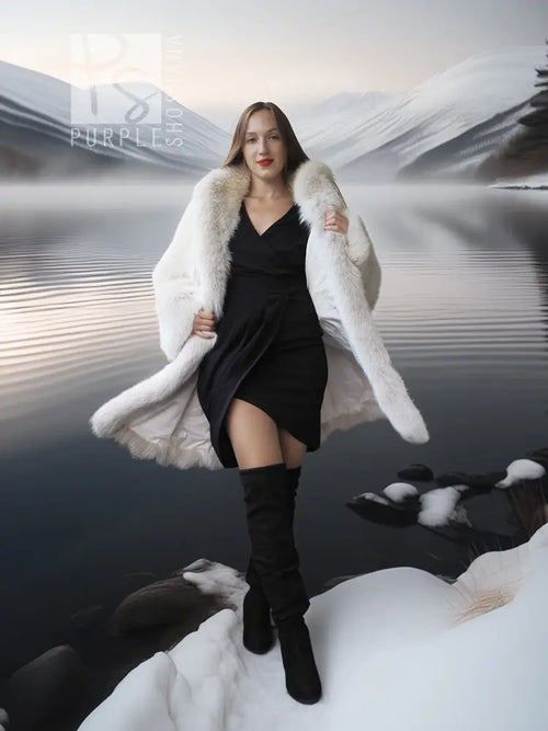 White faux fur fox coat with thick shawl collar and fluffy, flared hem