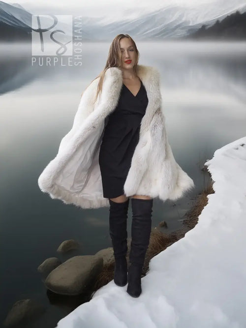 White faux fur fox coat with voluminous open front and soft, layered texture